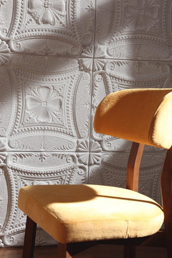 1040 Chantilly faux stone wall panel chair close up